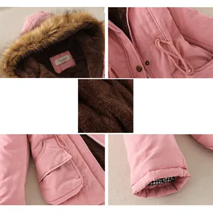 Cozy pink winter parka for women featuring large faux fur collar and lamb wool lining