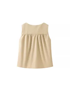 Women's chic beige sleeveless pleated vest top, minimalist and versatile spring fashion.