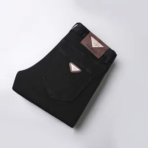 Jean noir slim de qualité supérieure pour homme avec logo abeille en métal doré distinctif