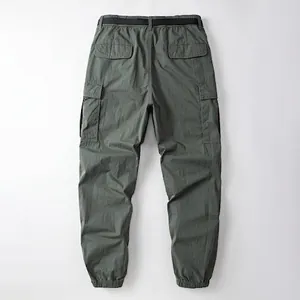 Loose fit Japanese style cargo pants with jogger cuffs and multi-pocket design