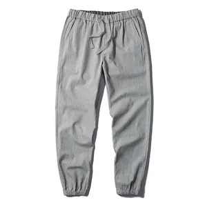 Men's Japanese style casual light grey jogger pants with elastic waist and drawstring