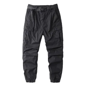 Versatile black Japanese-style cargo pants with multi-pockets, belt, and jogger cuffs
