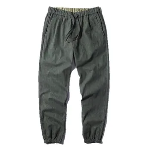 Japanese style men's casual harem joggers in dark grey featuring an elastic drawstring waist