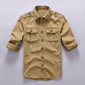 Classic men's khaki cotton workwear shirt featuring double chest pockets and lapel collar