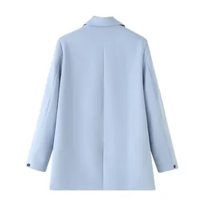 Back view of a tailored light blue casual blazer for women, modern office style.