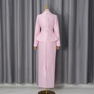 Elegant pink satin suit set featuring a peplum blazer and long skirt with back slit