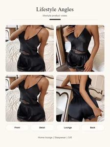 Gedetailleerde lifestyle-weergaven van zwart satijnen pyjama-set met kant voor dames