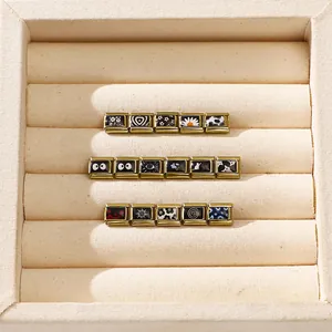 Eslabones de pulsera modular italiana DIY serie negra con ojos y corazones en caja beige