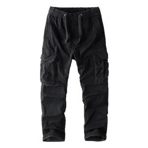 Men's vintage black cargo pants featuring multi-pockets and a drawstring elastic waist