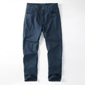 Vintage American style men's washed cotton straight-leg pants in dark blue color