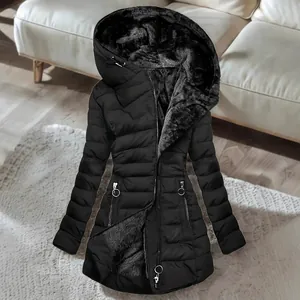 Detailed view of black women's winter puffer coat with warm fleece lining and hood