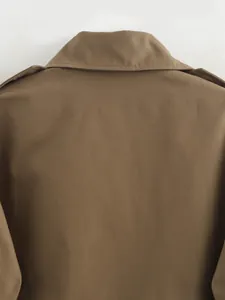 Close-up view of the back collar and shoulder details on a brown short trench jacket