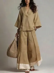 Conjunto francés de lino y algodón para mujer con blusa escote en V y pantalón ancho.