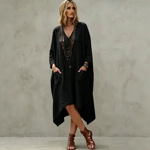 Oversized black V-neck cotton linen dress with irregular hem and pockets detail