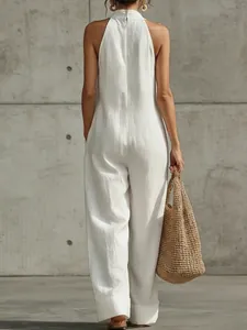 Elegant back view of white linen sleeveless wide-leg jumpsuit for summer casual wear