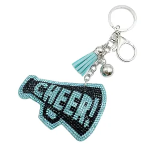 Rhinestone megaphone keychain with CHEER lettering and blue suede tassel