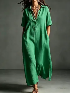 Elegant emerald green cotton linen maxi dress with short sleeves and a chic lapel collar.