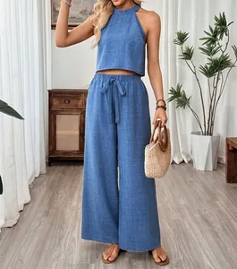 Two-piece casual blue halter sleeveless crop top and wide-leg trousers set for summer