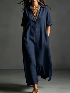Elegant navy blue cotton linen maxi dress with short sleeves and a lapel collar.