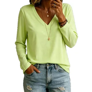 Minimalist lime green V-neck long sleeve T-shirt for women in a loose fit.