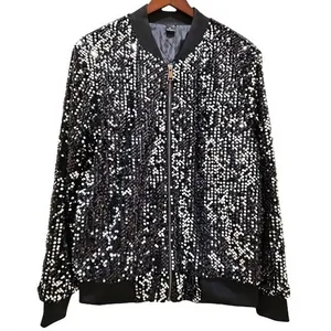 Detailed view of a shimmering black sequined bomber jacket designed for stage performance