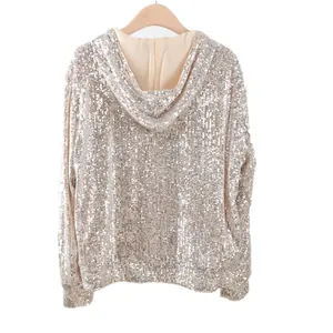 Detailed back view of a shimmering silver sequin hooded jacket for women fashion wear