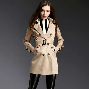 Detailed view of women's beige double-breasted trench coat with adjustable waist belt