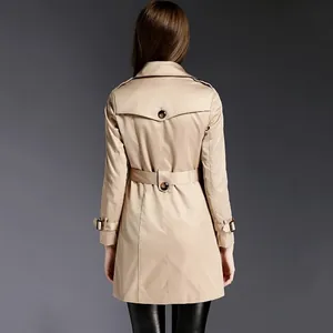 Back view of a classic khaki mid-length women's trench coat with waist belt