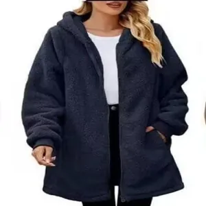Close-up view of navy blue teddy fleece jacket with hood and functional front zipper