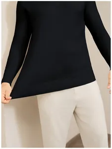 Close-up detail showing the fine ribbed hem and texture of a black men's knit sweater