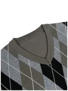 Detail showing the V-neckline and classic argyle pattern on a men's knitted sweater