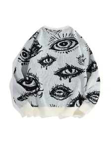 Detailansicht des dunklen Augenmusters auf diesem grauen Oversized-Strickpullover
