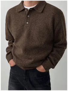 Close-up of men's brown knit polo sweater showing soft texture and collar detail