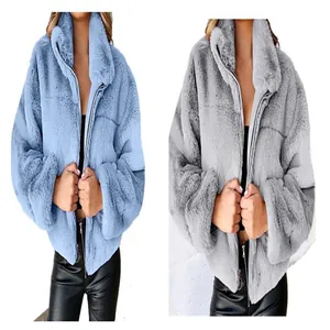 Close-up detail of soft faux fur texture on women's winter zip-up plush coat
