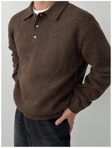 Close-up of men's brown long-sleeve knit polo sweater showing texture and collar detail.