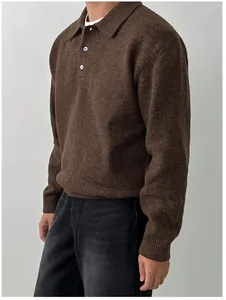 Detailed view of brown polo collar knit sweater showing thick texture and buttons