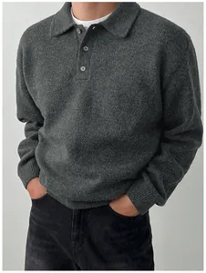 Macro view of men's dark gray knitted polo sweater featuring a classic collar and buttons