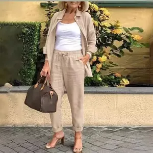 Elegant women's linen two-piece set featuring loose vintage harem pants and matching shirt