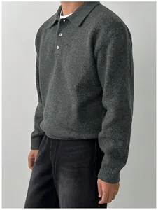 Side view detail of a men's grey polo neck knitted sweater for autumn and winter.