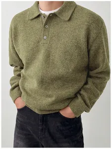Close-up detail of a men's olive green knit polo sweater showing soft wool texture and collar