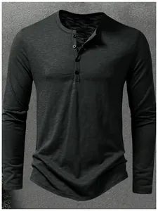 Macro detail of charcoal slub knit texture on a slim fit Henley long-sleeve shirt for men
