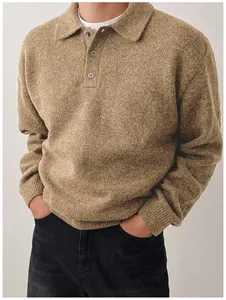 Detail of men's casual knit polo sweater in warm tan color with soft wool texture