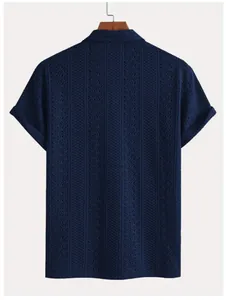 Detailed back view of a dark blue short sleeve knit shirt with vertical texture and polo collar