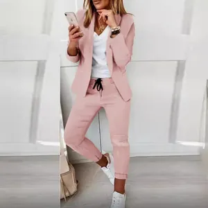 Professional pink two-piece casual blazer and trousers suit set for fashion-conscious women