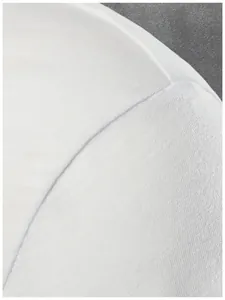 Macro view showing the shoulder seam and fine fabric texture of a white Henley shirt