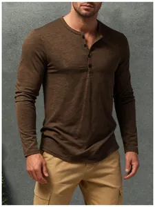 Detailed view of muscle fit long-sleeve Henley T-shirt with textured olive brown fabric