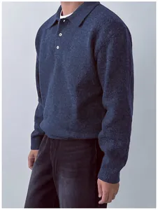 Side profile detail of a navy blue polo collar knit sweater for men with soft texture.