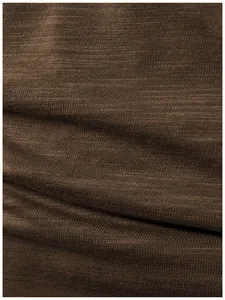 Close-up of dark brown slub knit fabric texture showing the material of men's Henley T-shirt