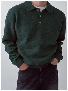 High quality detailed shot of a men's dark green polo collar knit sweater texture