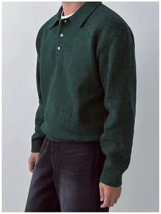 Close-up of the fuzzy texture on a dark green men's polo collar knit sweater for winter